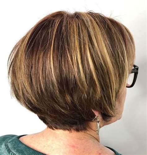 This haircut features layers and texture, creating a youthful and lively look as we age. . Short bob haircuts over 60